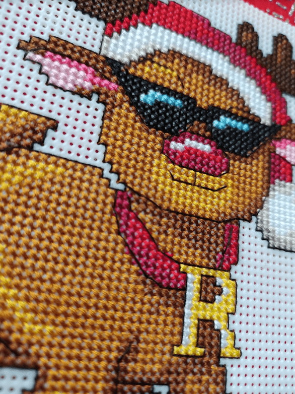 Christmas Toys 120CS Counted Cross-Stitch Kit featuring vibrant colors and included materials for holiday crafting.