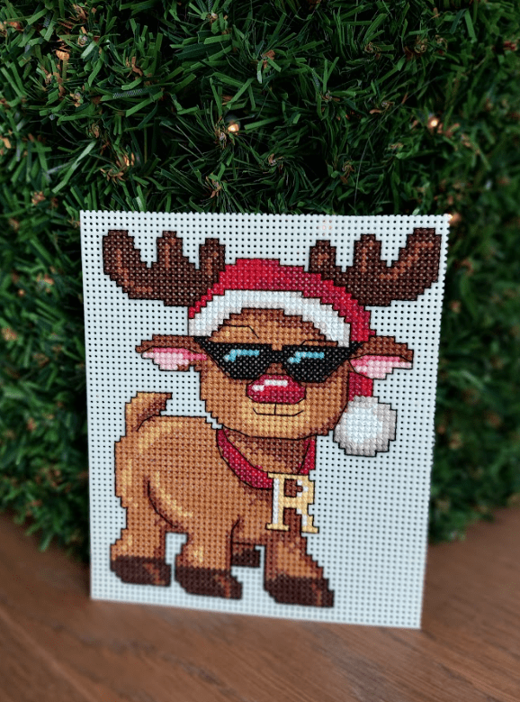 Christmas Toys 120CS Counted Cross-Stitch Kit featuring vibrant colors and included materials for holiday crafting.