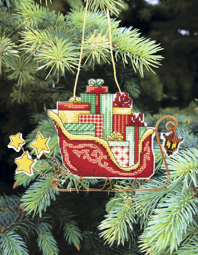 Colorful Christmas tree toy cross-stitch kit with plastic canvas and Madeira cotton floss.
