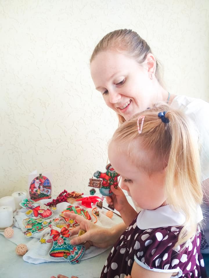 Colorful Christmas tree toy cross-stitch kit with plastic canvas and Madeira cotton floss.