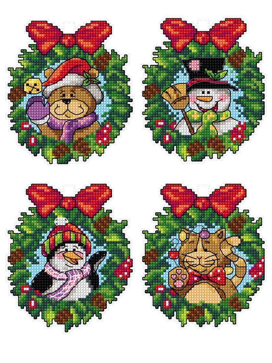A Christmas wreaths counted cross-stitch kit featuring vibrant threads, plastic canvas, and an instruction sheet.