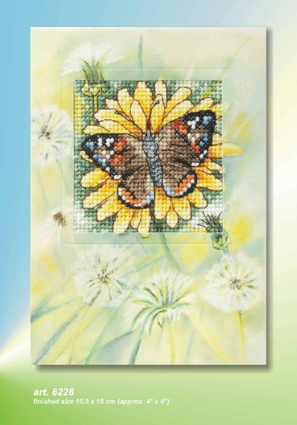 Complete counted cross stitch kit featuring a floral design, including Zweigart aida fabric, DMC threads, blank card, and envelope.
