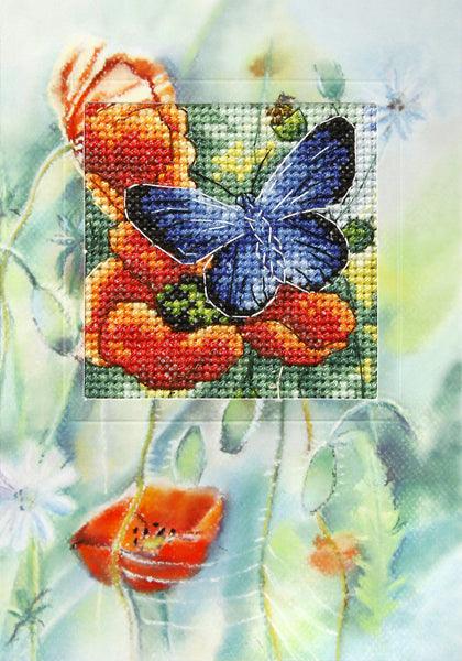 Complete counted cross stitch kit featuring floral design for greeting cards, including fabric, threads, and instructions.