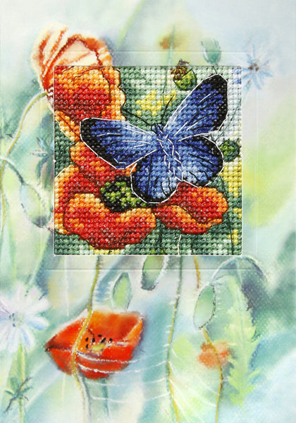 Complete counted cross stitch kit featuring floral design for greeting cards, including fabric, threads, and instructions.