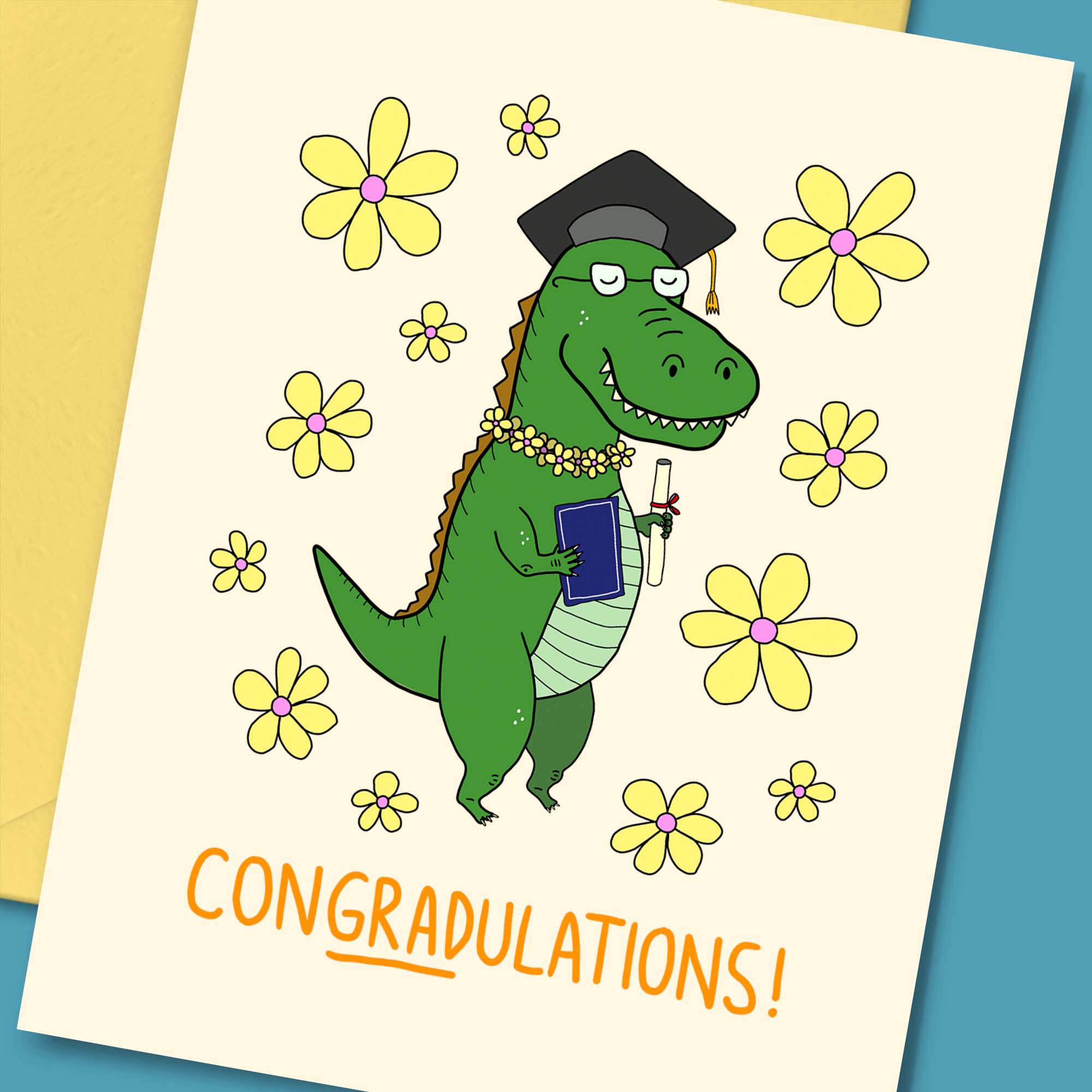 A cute graduation greeting card featuring a green dinosaur wearing a graduation cap and holding a diploma, with the text 'Con-GRAD-ulations.'