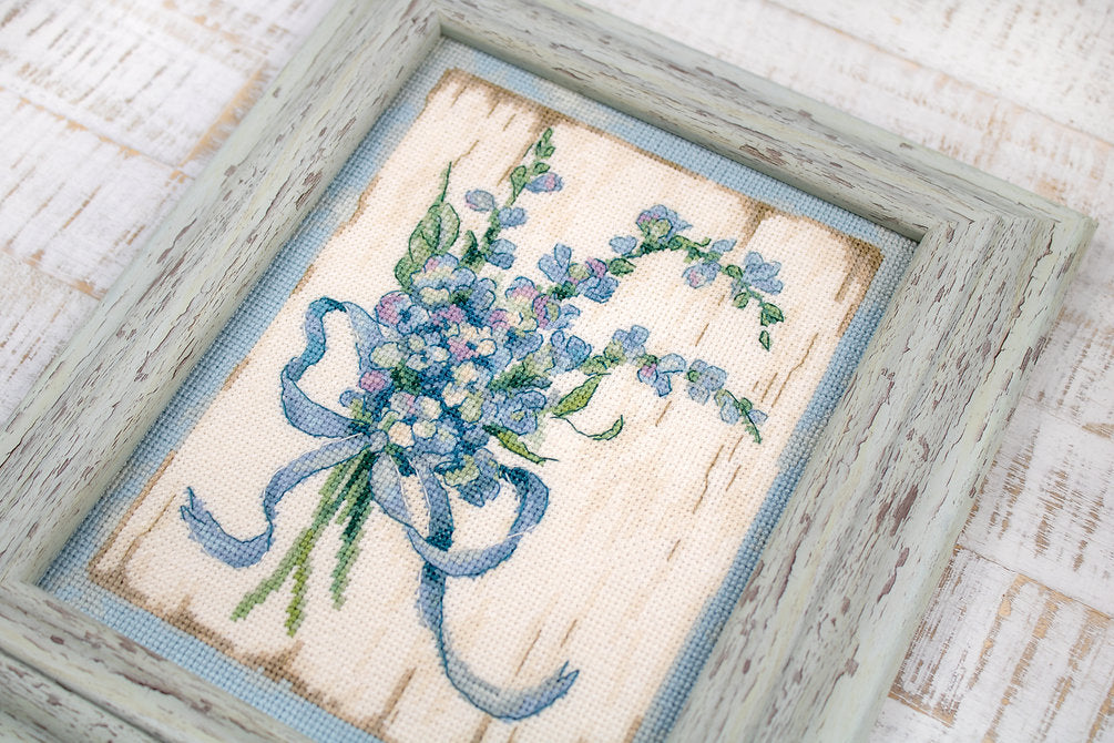 Counted Cross Stitch Kit BLUE I Leti974 featuring vibrant Anchor threads, canvas, needle, and instructions for crafting.