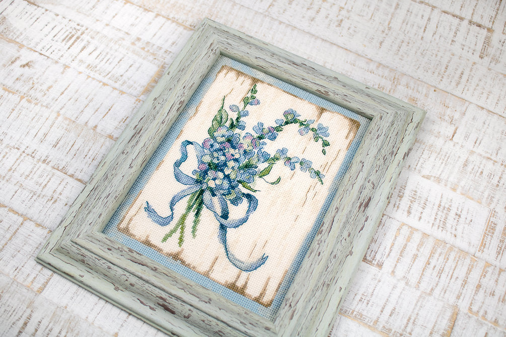 Counted Cross Stitch Kit BLUE I Leti974 featuring vibrant Anchor threads, canvas, needle, and instructions for crafting.