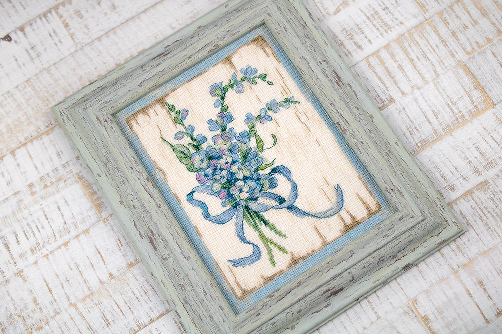 Counted Cross Stitch Kit BLUE I Leti974 featuring vibrant Anchor threads, canvas, needle, and instructions for crafting.