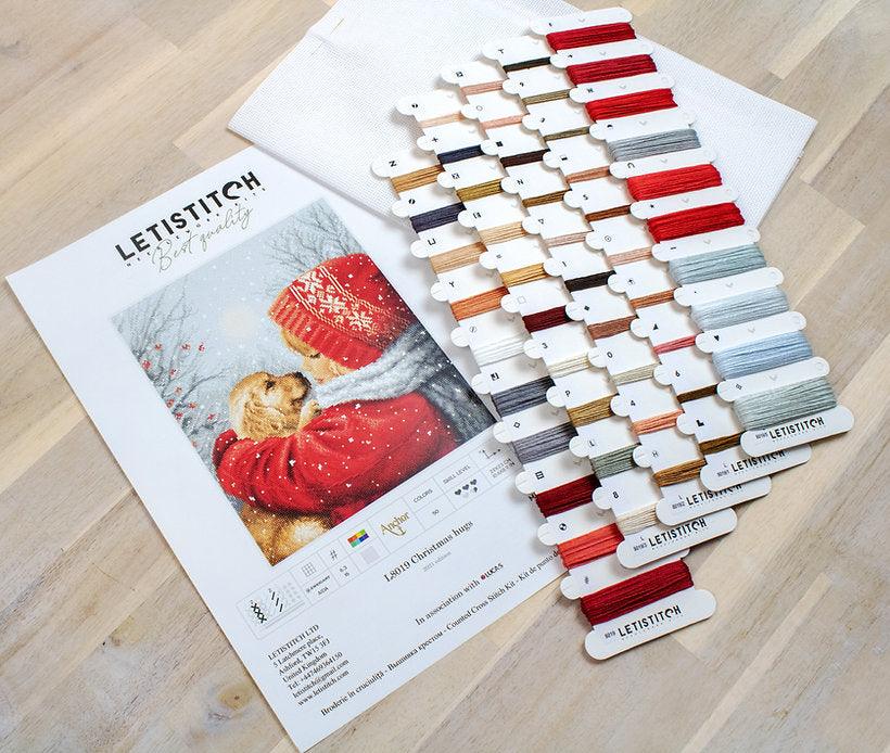 Counted Cross Stitch Kit Christmas Hugs L8019 featuring vibrant colors and Aida canvas.