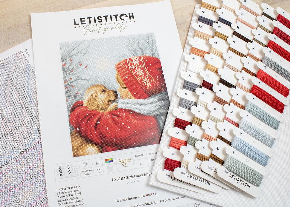 Counted Cross Stitch Kit Christmas Hugs L8019 featuring vibrant colors and Aida canvas.