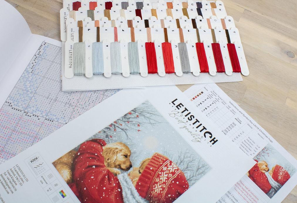 Counted Cross Stitch Kit Christmas Hugs L8019 featuring vibrant colors and Aida canvas.