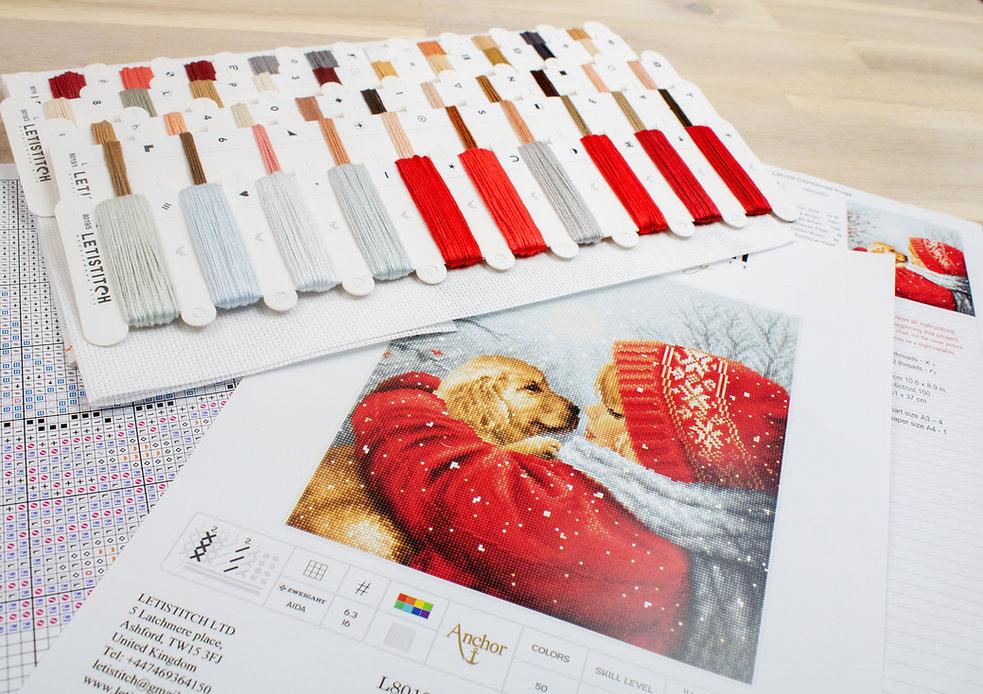 Counted Cross Stitch Kit Christmas Hugs L8019 featuring vibrant colors and Aida canvas.