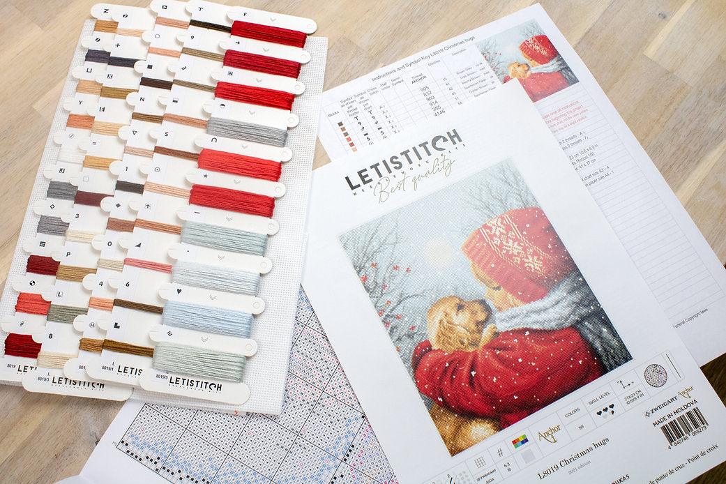 Counted Cross Stitch Kit Christmas Hugs L8019 featuring vibrant colors and Aida canvas.