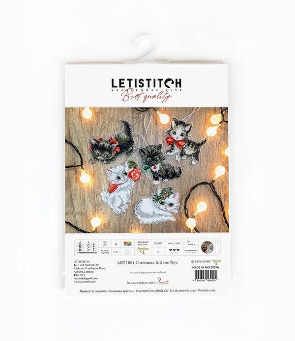 Counted Cross Stitch Kit featuring Christmas Kittens with vibrant colors and included materials.