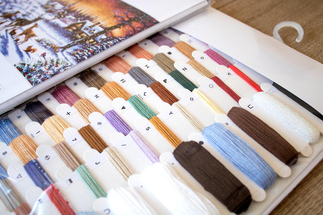 Counted Cross Stitch Kit Christmas Wood Leti947 featuring colorful threads and Aida canvas for festive stitching.