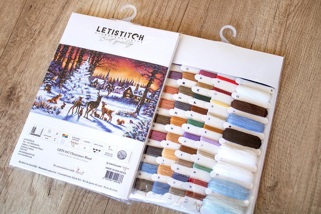 Counted Cross Stitch Kit Christmas Wood Leti947 featuring colorful threads and Aida canvas for festive stitching.