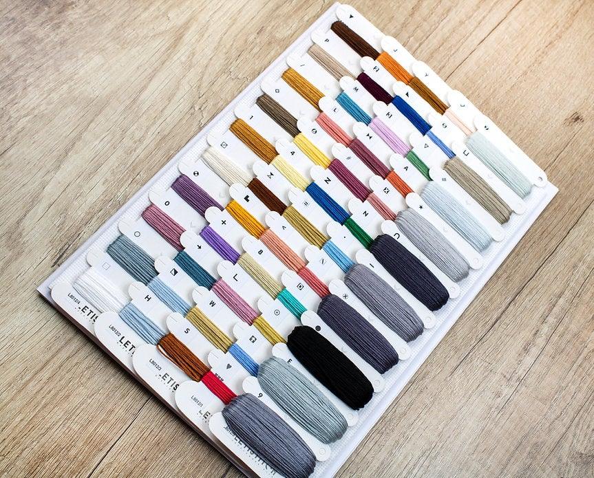 Counted Cross Stitch Kit New York featuring vibrant colors and detailed design on Zw.Aida canvas.