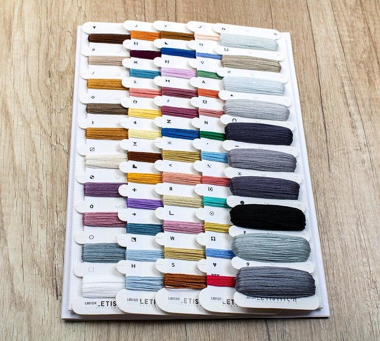 Counted Cross Stitch Kit New York featuring vibrant colors and detailed design on Zw.Aida canvas.