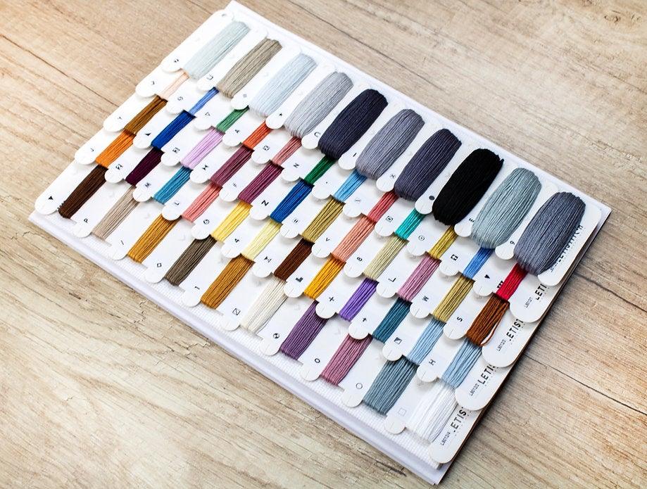 Counted Cross Stitch Kit New York featuring vibrant colors and detailed design on Zw.Aida canvas.