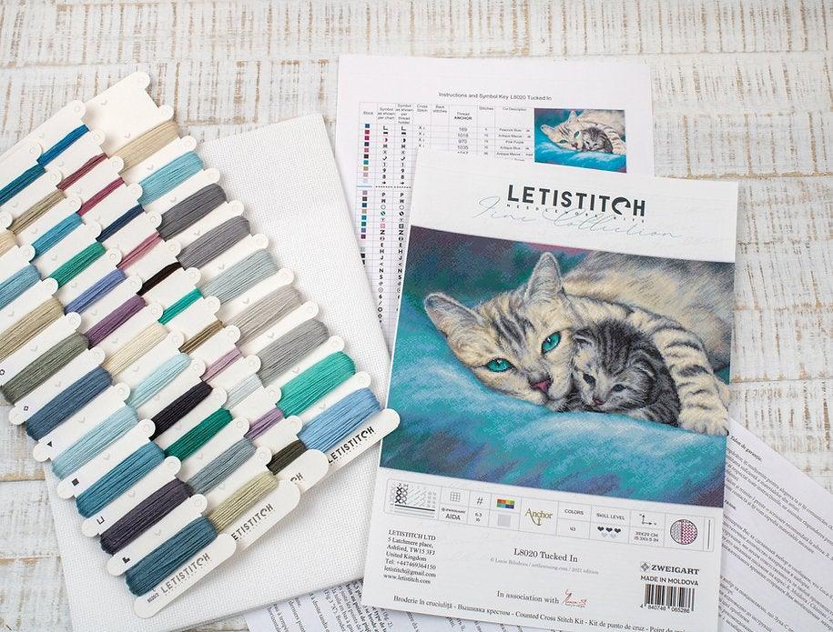 Counted Cross Stitch Kit Tucked In L8020 featuring vibrant threads, Aida canvas, and included needle and instructions.