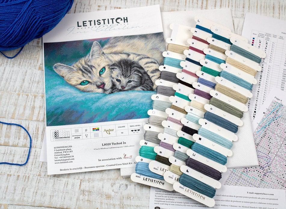 Counted Cross Stitch Kit Tucked In L8020 featuring vibrant threads, Aida canvas, and included needle and instructions.