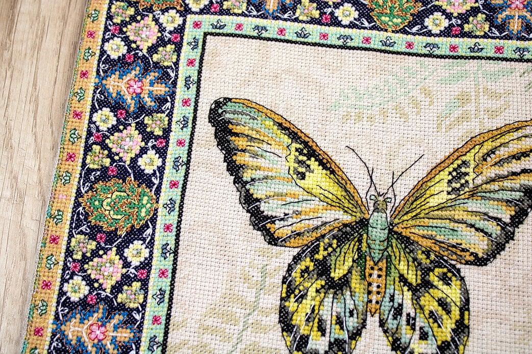 Counted Cross Stitch Kit Vintage Butterfly Leti981 with canvas, threads, and needle, showcasing vibrant colors and butterfly design.