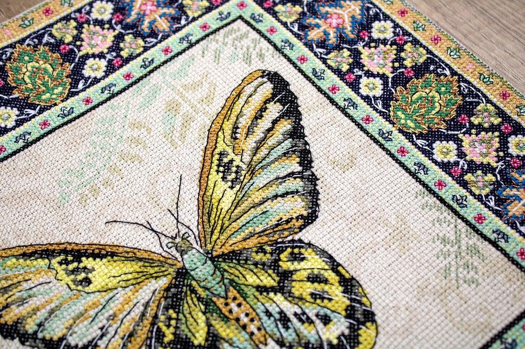Counted Cross Stitch Kit Vintage Butterfly Leti981 with canvas, threads, and needle, showcasing vibrant colors and butterfly design.