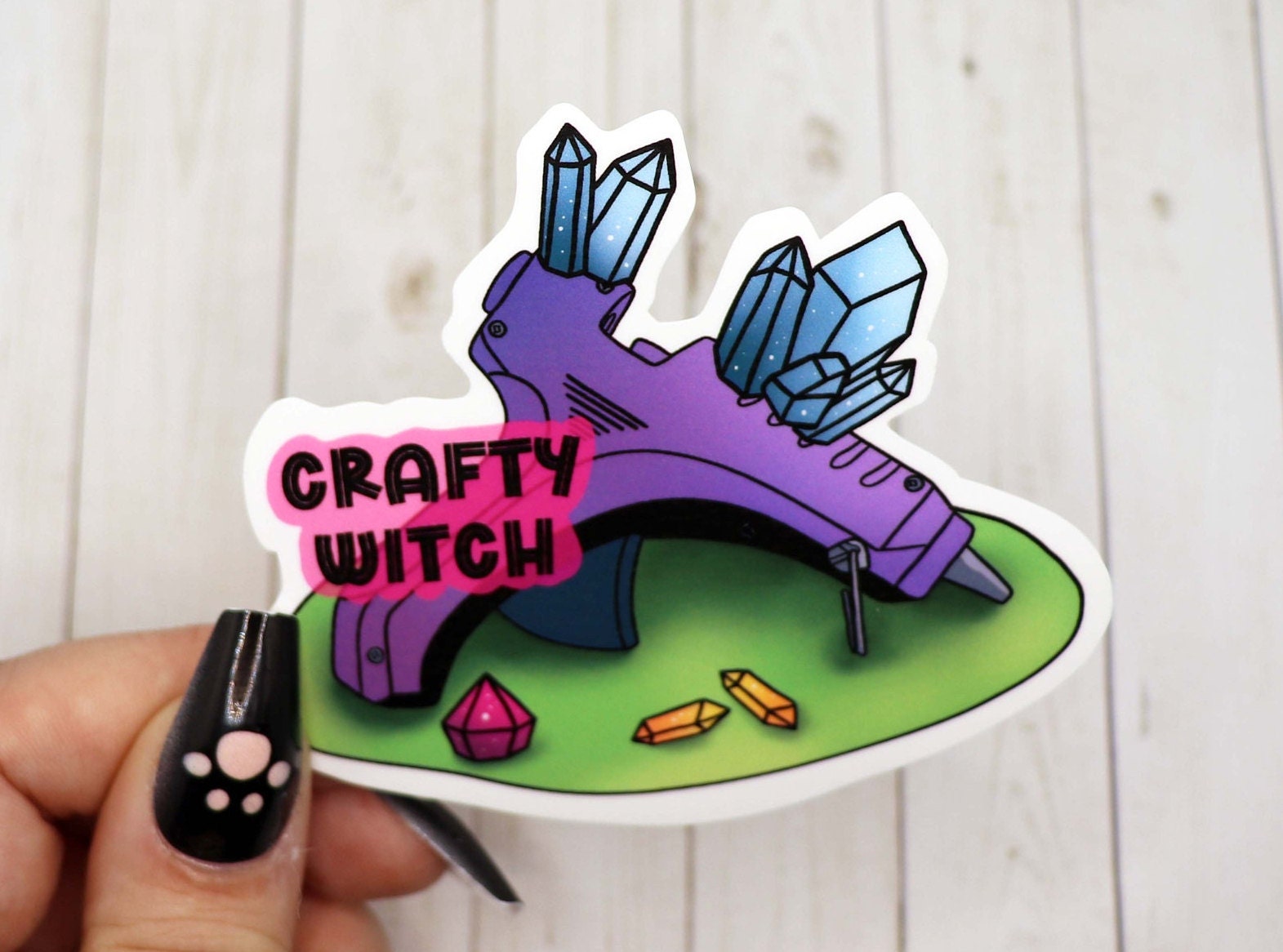 Crafty Witch Sticker featuring a whimsical design, measuring 2.7 inches, perfect for personalizing various items.