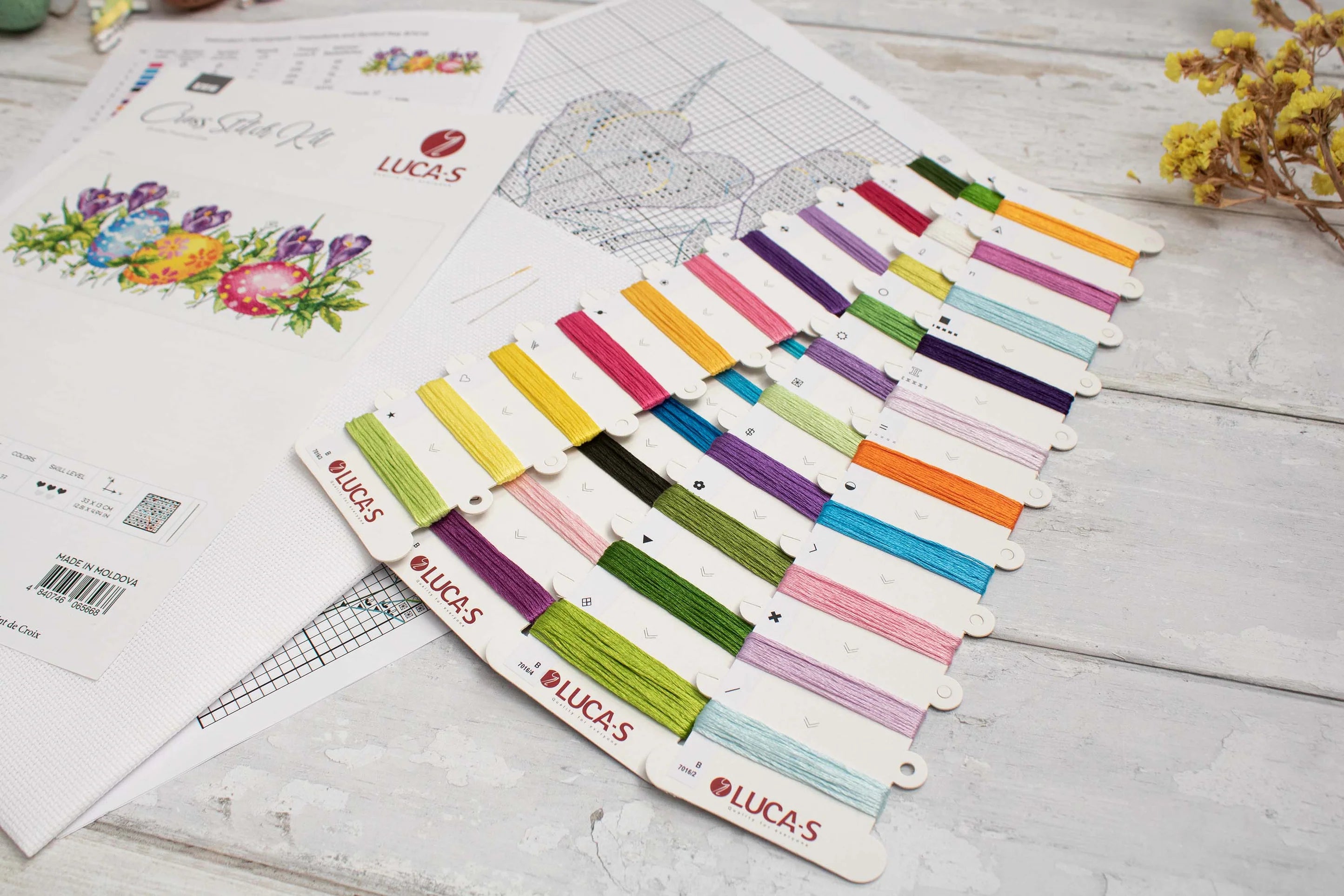 Crocus B7016L Counted Cross-Stitch Kit featuring colorful threads, Aida canvas, and needle.