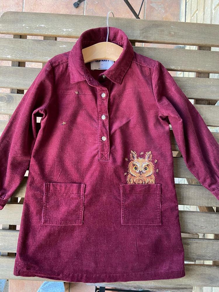 Curious Owl cross stitch kit featuring water-soluble canvas, cotton threads, and a needle for DIY clothing projects.