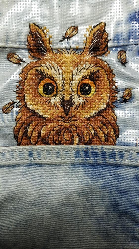 Curious Owl cross stitch kit featuring water-soluble canvas, cotton threads, and a needle for DIY clothing projects.
