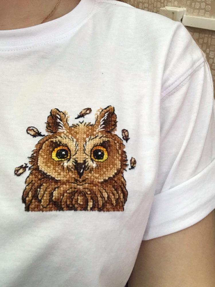 Curious Owl cross stitch kit featuring water-soluble canvas, cotton threads, and a needle for DIY clothing projects.