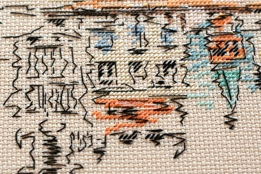 Cross-stitch kit Colored town-1 AH-137 featuring a beige canvas, 23 colorful floss threads, and organized stitching materials.