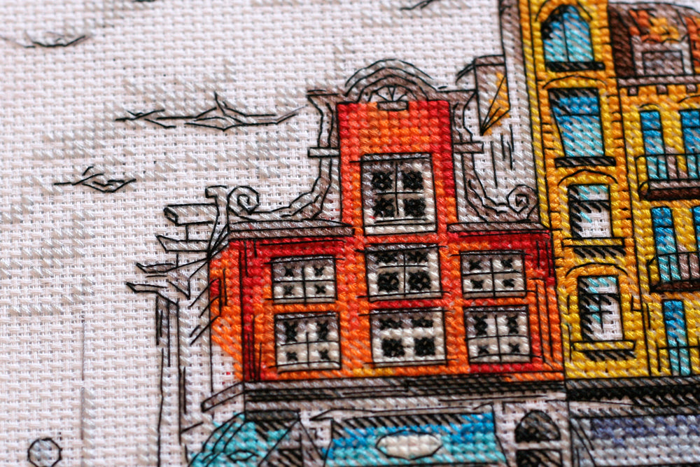 Cross-stitch kit Colored town-2 AH-147 featuring cotton canvas, colorful floss, and symbol scheme for easy stitching.