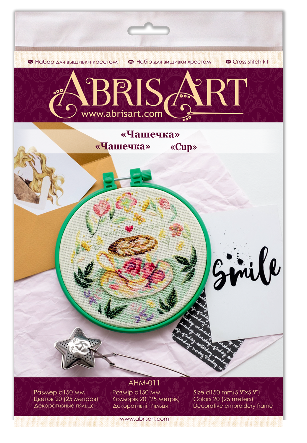 Cross-stitch kit Cup AHM-011 featuring cotton canvas, colorful floss, and needles for crafting.