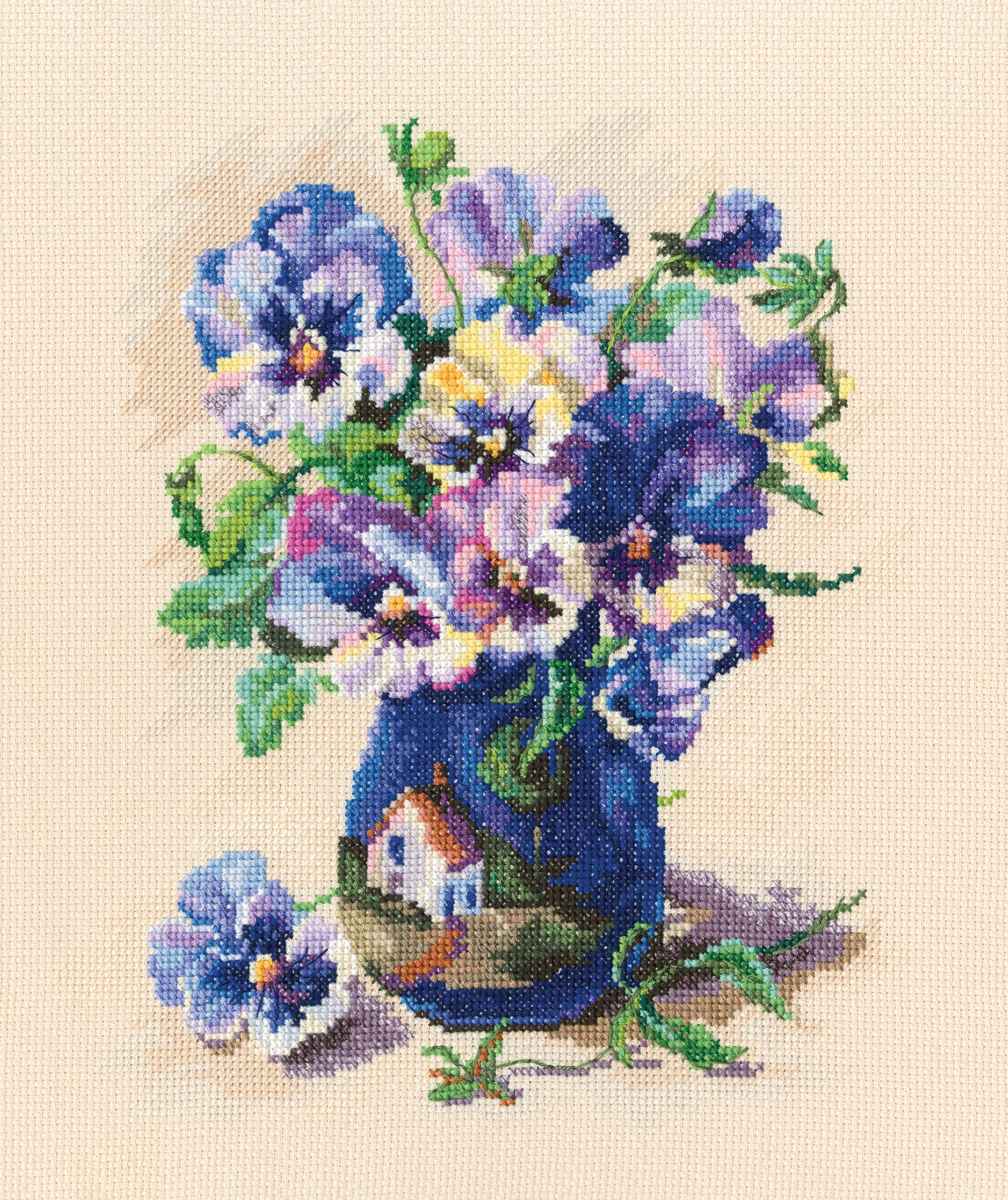 Cross-stitch kit featuring pansies design with Aida canvas, DMC threads, and accessories for crafting.