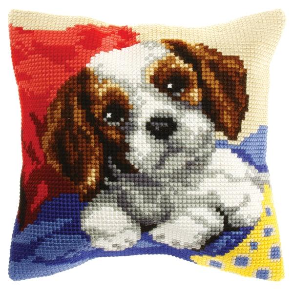 Cushion cross stitch kit featuring a dog design, including printed canvas, yarn, needle, and instructions.