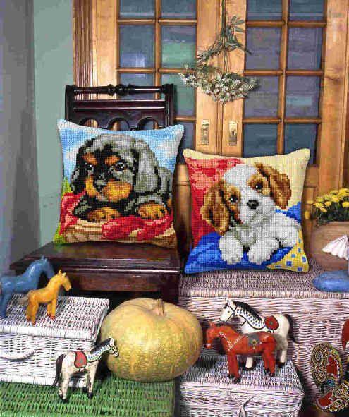 Cushion cross stitch kit featuring a dog design, including printed canvas, yarn, needle, and instructions.