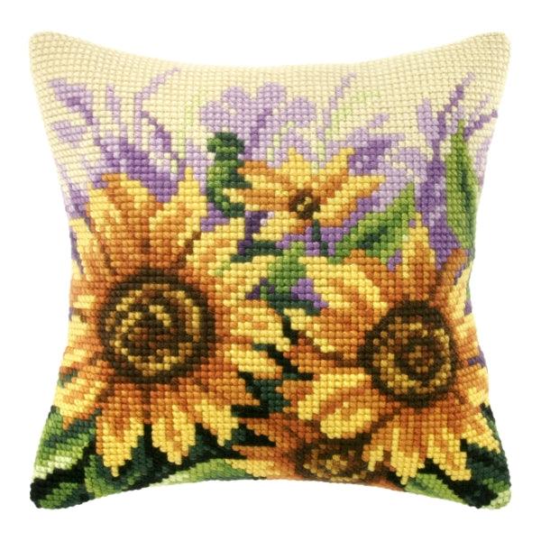 Cushion cross stitch kit featuring sunflowers on a meadow, including printed canvas, yarn, needle, and instructions.
