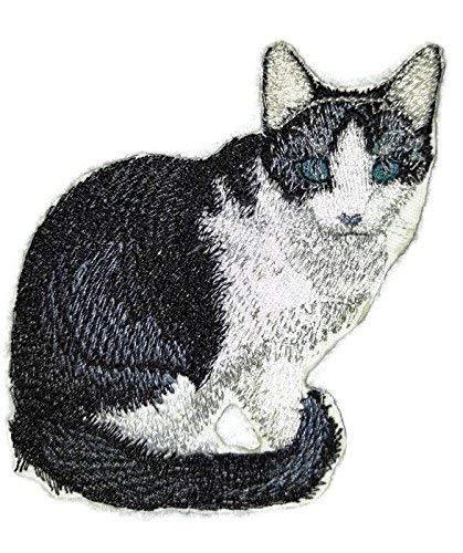 Custom Trixie Cat embroidered patch, showcasing vibrant colors and intricate design, perfect for iron-on or sew-on application.