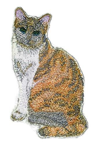 Custom embroidered patch featuring a tortoiseshell cat design, ideal for iron-on or sew-on application.
