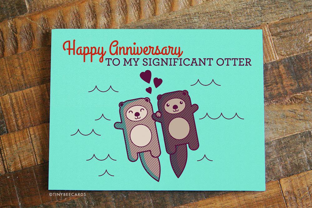 Cute Anniversary Card featuring two otters holding hands, designed for expressing love.