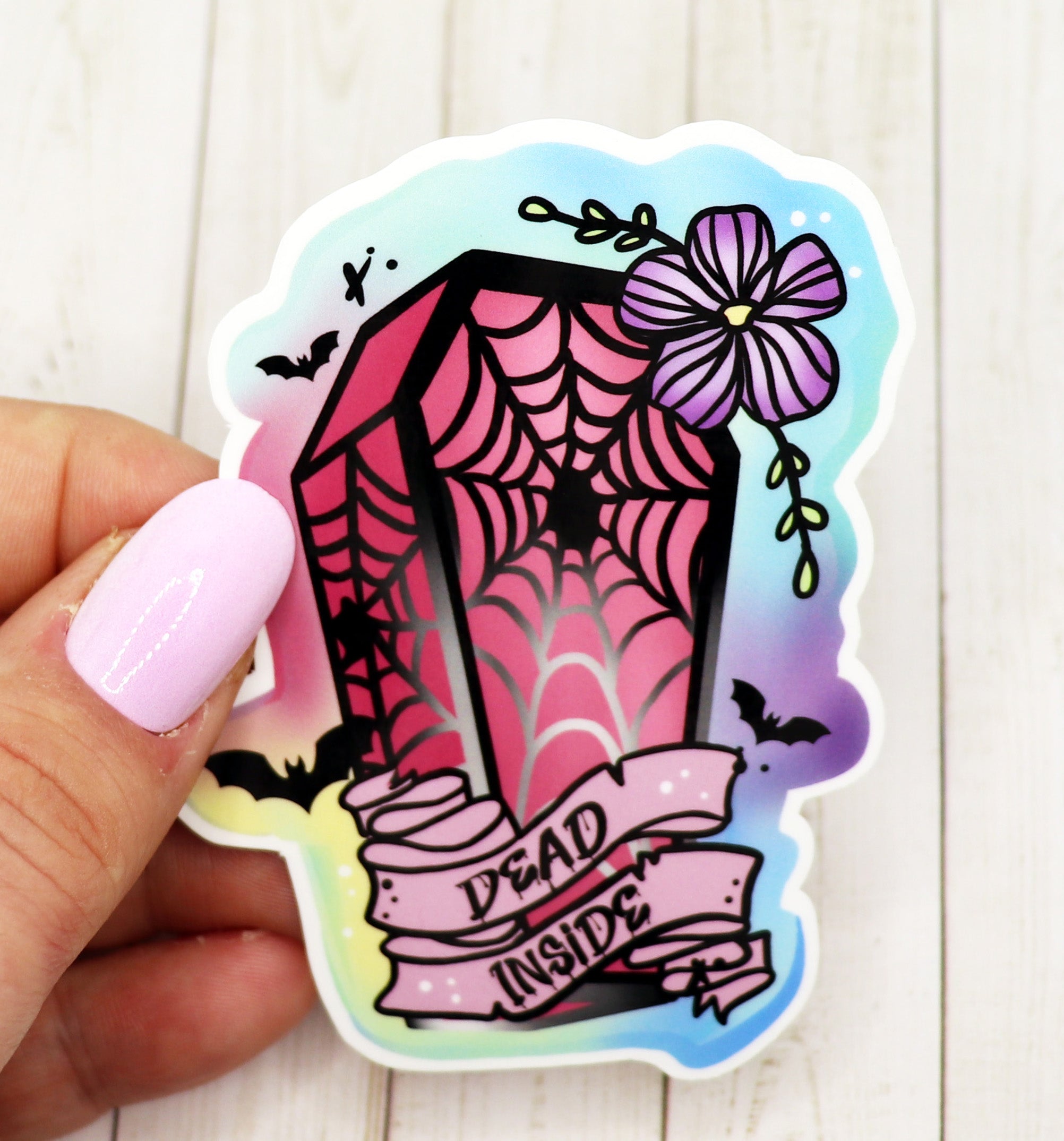 Dead Inside Coffin Sticker featuring a coffin design with dark humor, printed on matte vinyl.