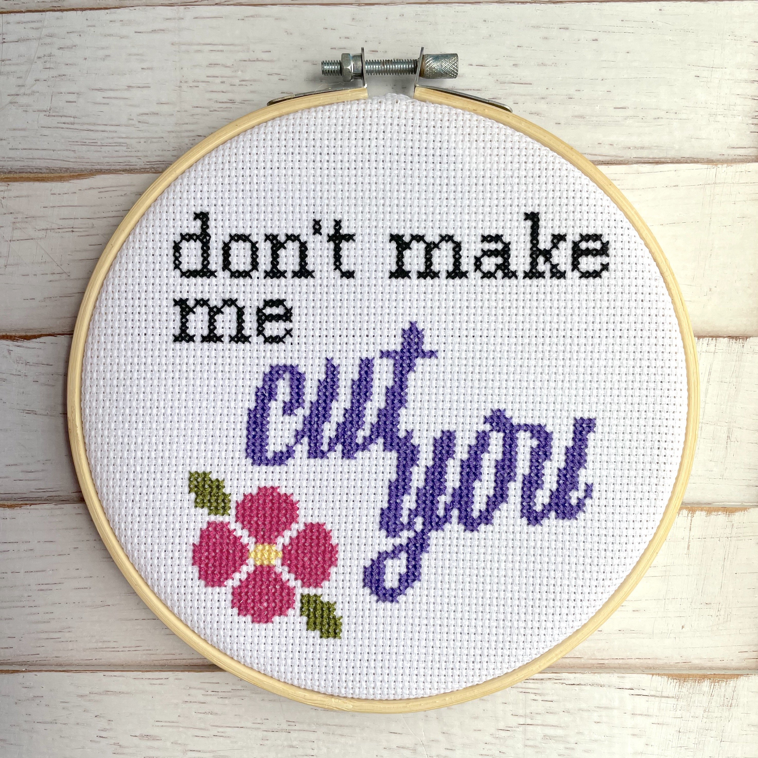 Don't Make Me Cut You Version 2 Cross Stitch KIT featuring floral elements and cursive design, includes all necessary materials for crafting.