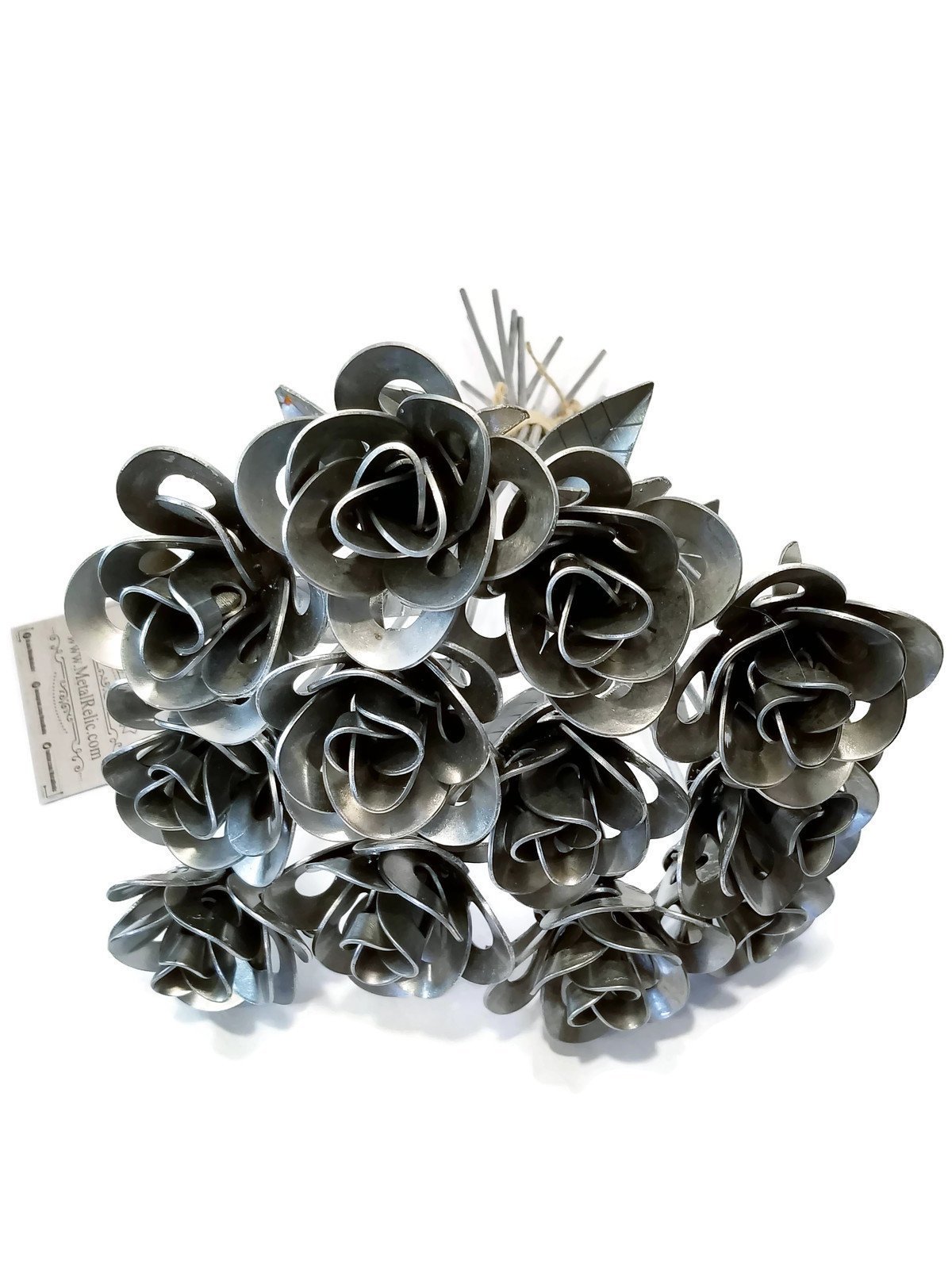 A dozen handcrafted metal roses made from recycled washers and wire, showcasing unique designs and a shiny lacquer finish, perfect for gifting.