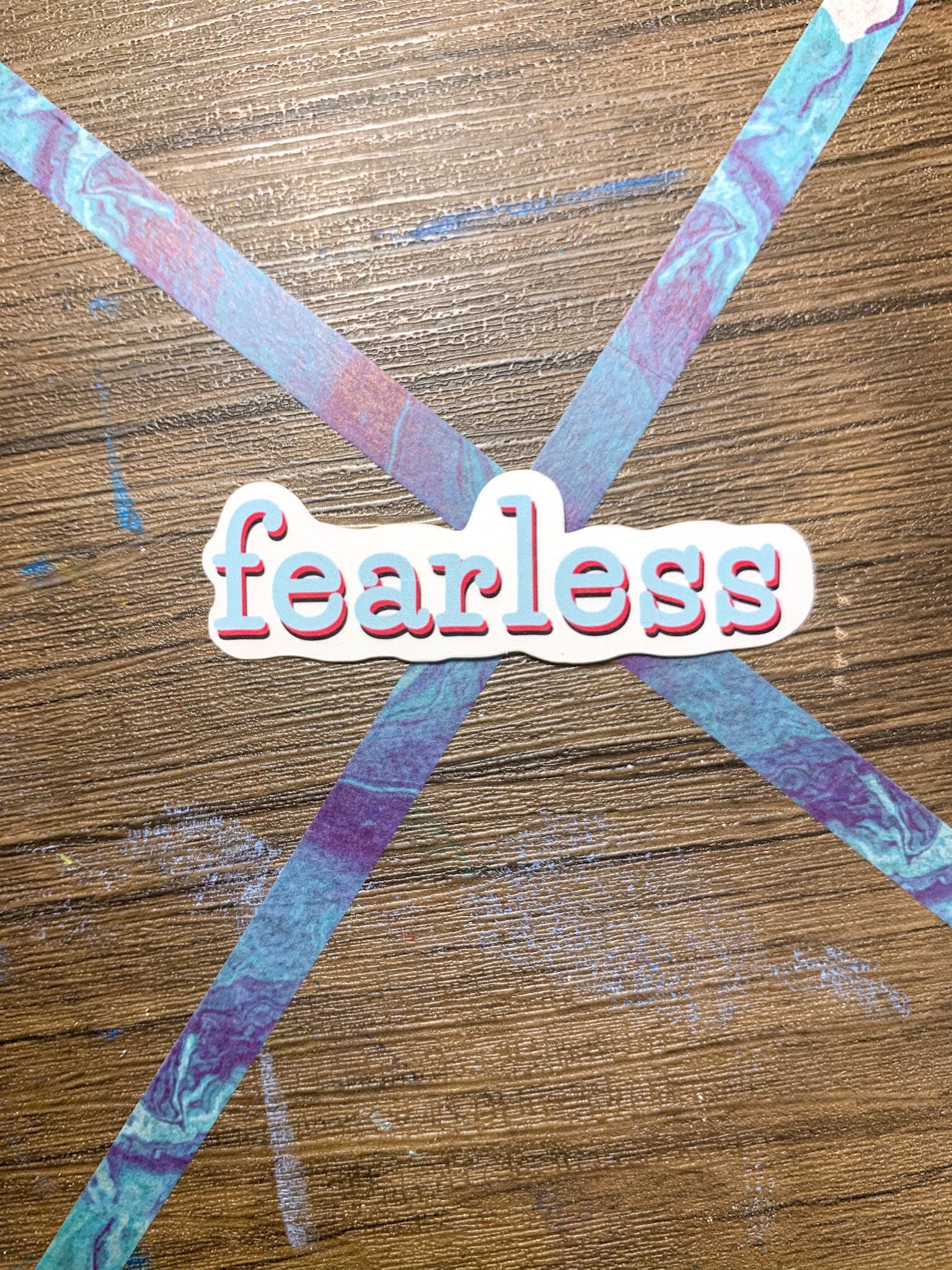 Fearless Sticker featuring a cute aesthetic design, perfect for customizing various items like hydroflasks and laptops.