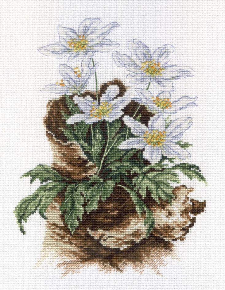 First Flowers SNV-567 Counted Cross Stitch Kit featuring AIDA canvas, cotton threads, and a needle for crafting.