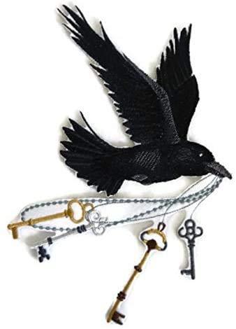 Flying Raven embroidered patch featuring skeleton keys, showcasing intricate details and vibrant colors on a cotton base.