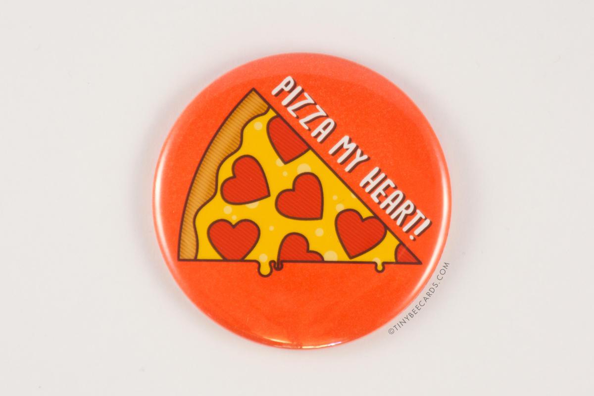 A 2.25-inch round button featuring a delicious pizza with heart-shaped pepperoni and the text 'Pizza My Heart'.