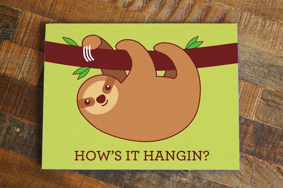 Funny sloth greeting card with the text 'How's it Hangin?' featuring a cute sloth illustration.
